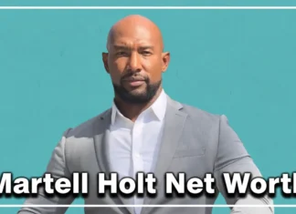 Martell Holt Net Worth: Real Estate Empire, TV Income & Full Wealth Breakdown Martell Holt net worth — real estate entrepreneur standing in front of a custom-built luxury home in Huntsville Alabama 2026