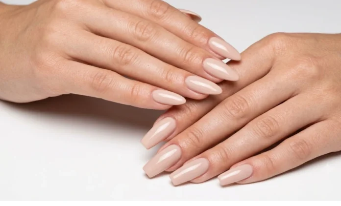 Coffin vs Almond Nails comparison photo showing both manicured nail shapes side by side on natural hands for reference.