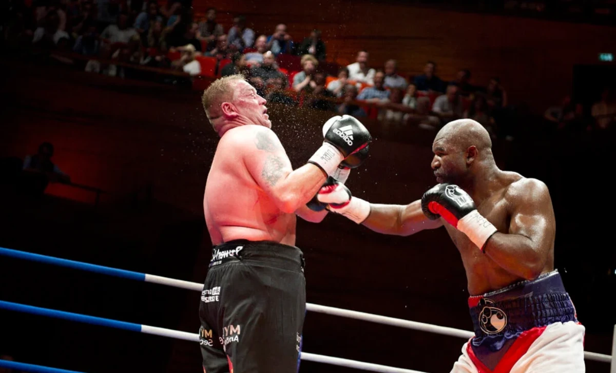 Evander Holyfield net worth career highlights — championship fights in the 1990s heavyweight golden era