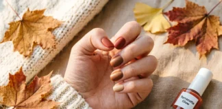 fall nail colors 2026 featuring warm terracotta and clay shades on natural nails