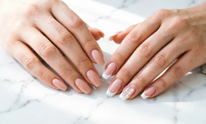 Gel vs Acrylic Nails Comparison Side-by-side comparison of gel vs acrylic nails showing glossy gel finish and sculpted acrylic set on natural hands