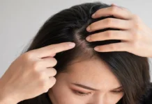 Scalp Tender in One Spot? 6 Common Causes Explained Woman checking scalp tender in one spot by pressing gently on her head