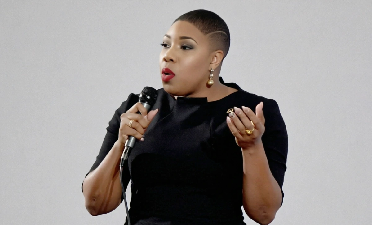Infographic showing Symone Sanders net worth income sources including MSNBC salary, political advisory fees, book royalties, and speaking engagements