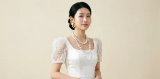 Bridal Jewelry Trends 2026 featuring sculptural earrings, layered pearls, and a lab-grown diamond ring