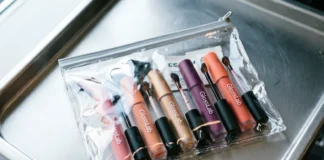 Lip gloss tubes in a TSA-approved quart bag, showing is lip gloss a liquid TSA rule in action